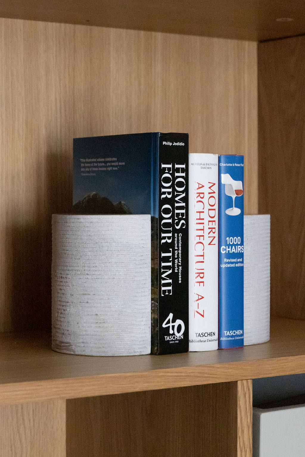 Vida marble bookends with modern design, crafted from marble to hold books stylishly.