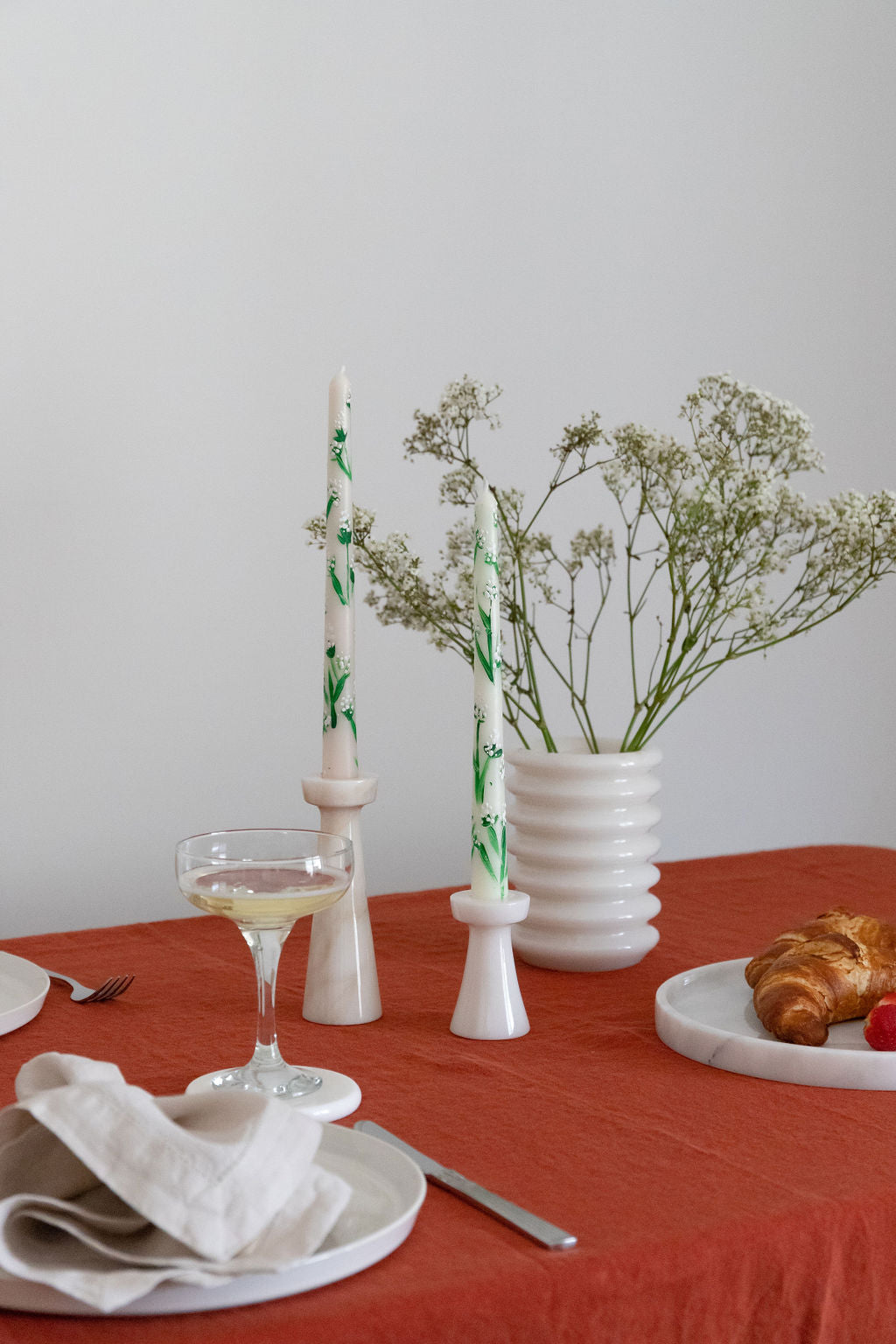 Elegant tablescape featuring handcrafted marble decor, linen tablecloth, and napkins from Urban Society Studio, styled for a sophisticated brunch setting.